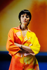 Diffuse bright orange & yellow jumpsuit